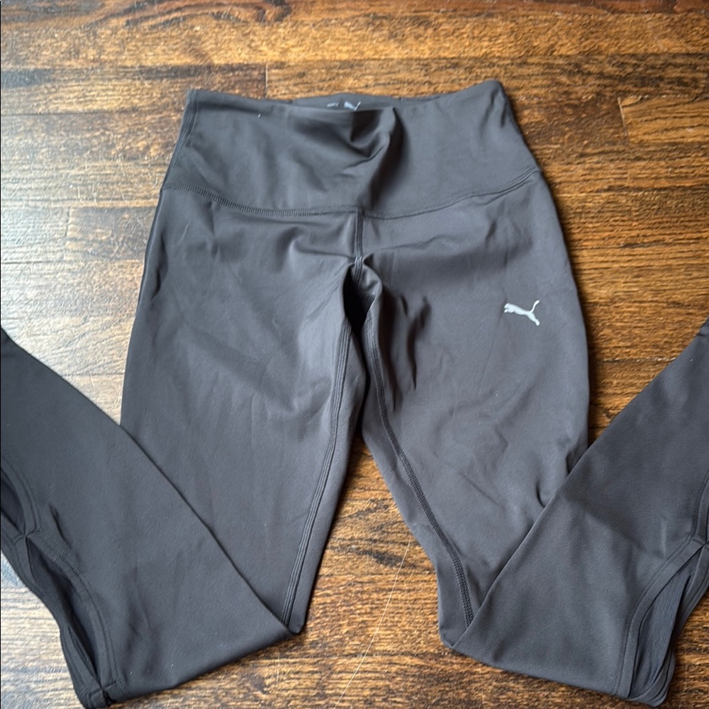 Puma Charcoal Leggings with sheer design on sides NWT size small